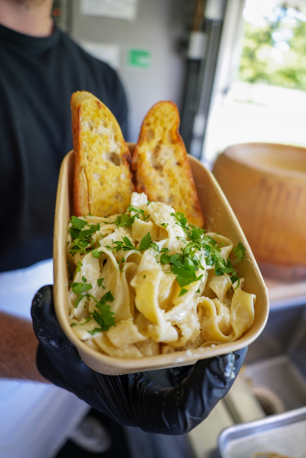 A finished bowl of fresh Alfredo pasta